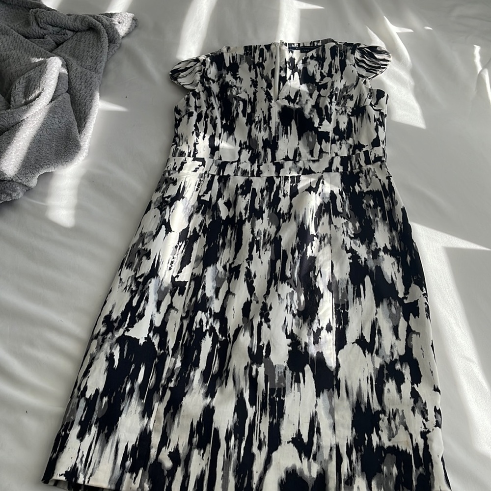 Black and white graphic dress with flutter sleeves